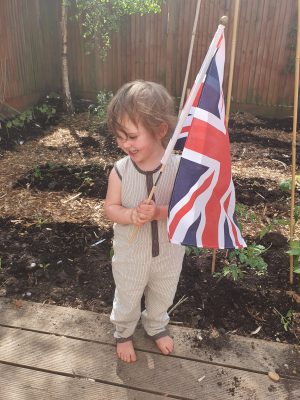 VE Day Flag Child Dig for Victory